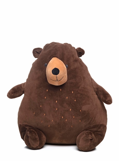 cute brown teddy bear plush toy sitting on a white background