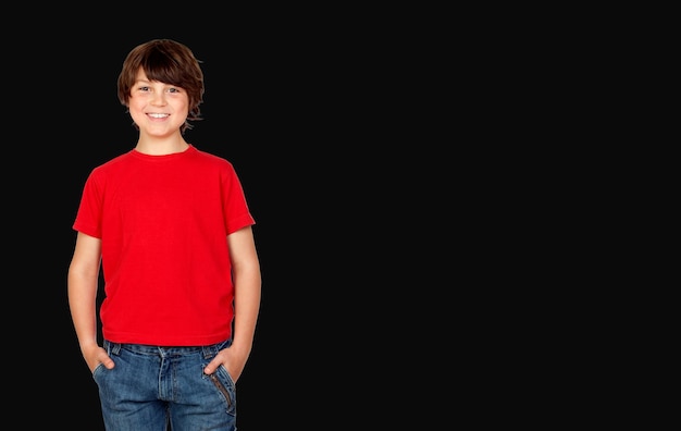 Cute brunette boy in red t shirt