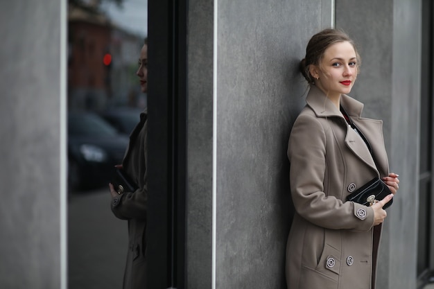 Cute businesswoman goes to a business meeting in a cafe