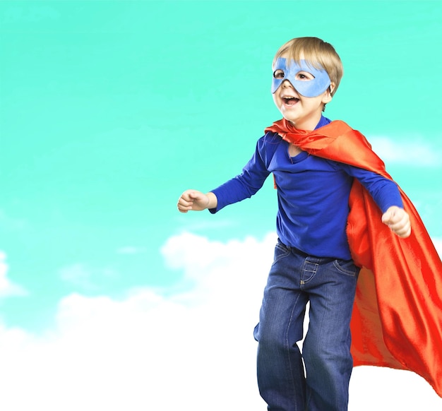 Cute Child boy in superhero costume