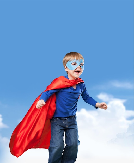 Cute Child boy in superhero costume