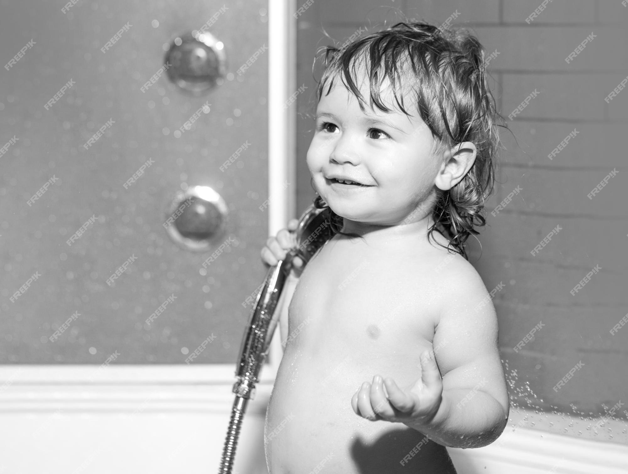Premium Photo | Cute child playing in bathtube funny happy baby bathes in  bathtub with water and foam kids hygiene
