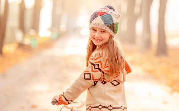 Cute child with bicycle