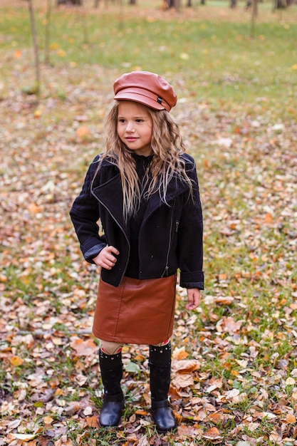 Cute children playing and laughing on autumn walk