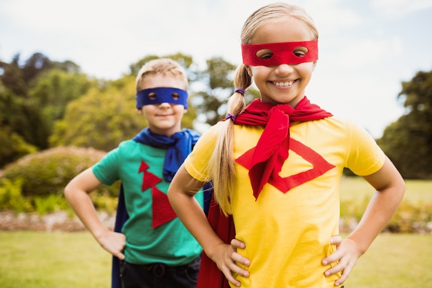 Cute children posing with hands on hips