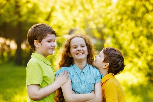 Cute children resting in summer park. family, happy childhood concept.