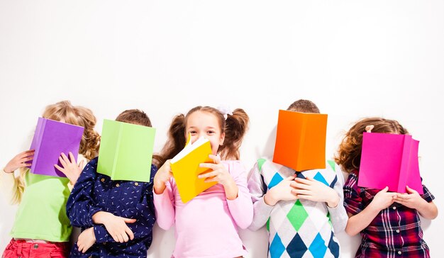 The cute children with books