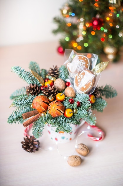 Cute Christmas flat lay with ginger bread man and bokeh lights on wood Mockup gift card