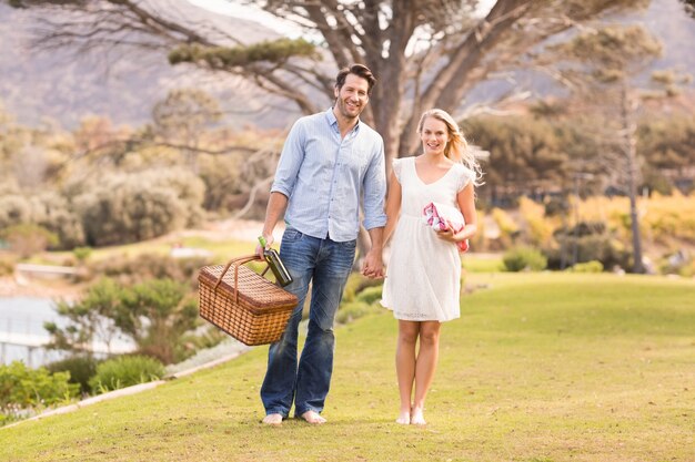 Cute couple on date walking in the park