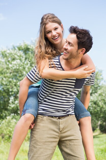 Cute couple having fun in park