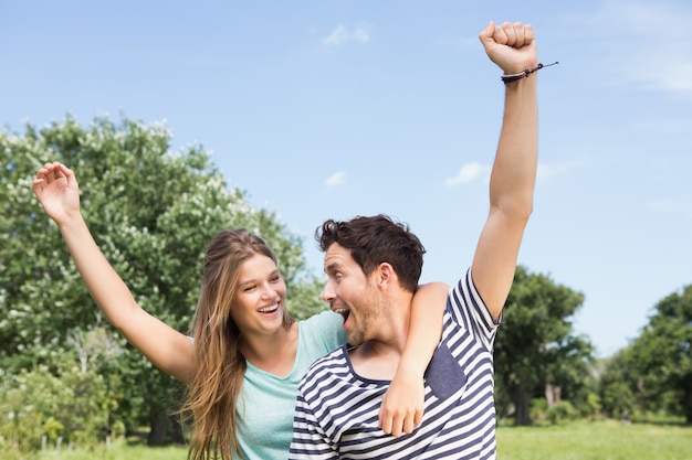 Cute couple having fun in park