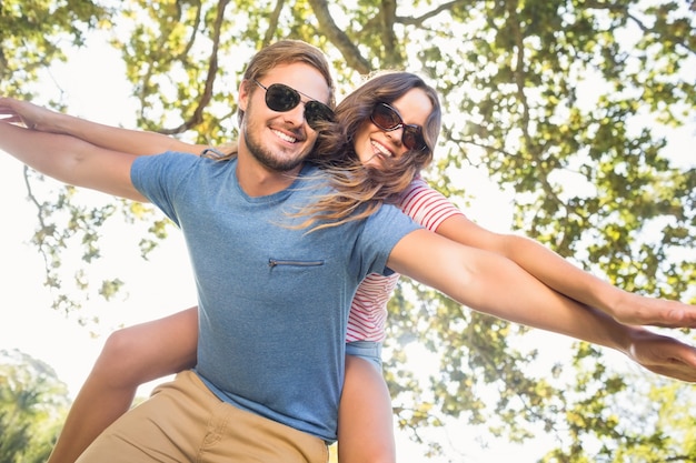 Cute couple having fun in park