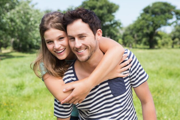 Cute couple having fun in park