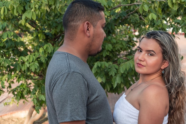 Cute couple in the park on a sunny day