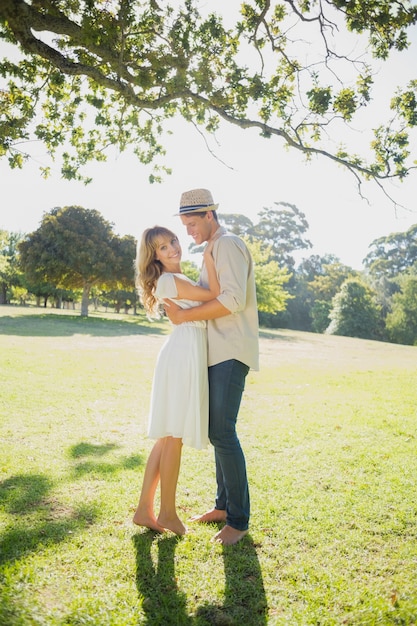 Cute couple posing in the park