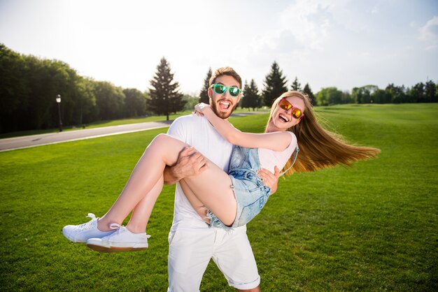 Cute couple posing together outdoors