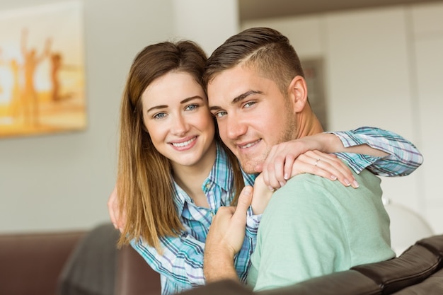 Cute couple relaxing on couch