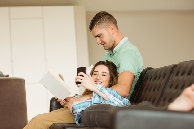 Cute couple relaxing on couch