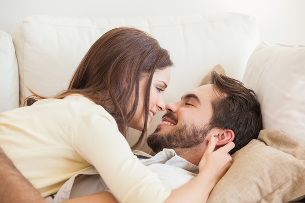 Cute couple relaxing on couch 