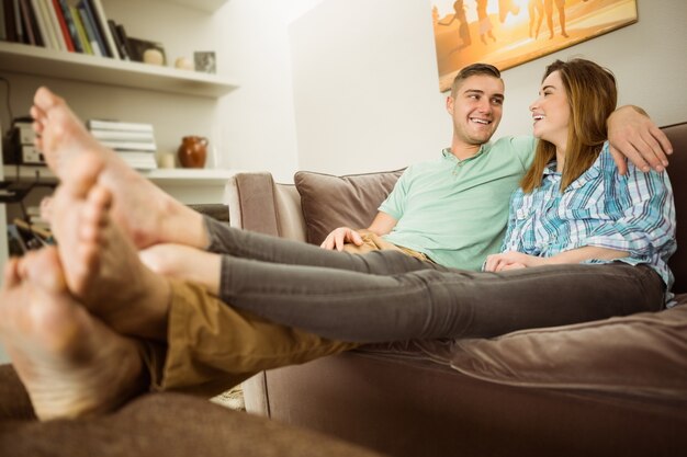 Cute couple relaxing on couch