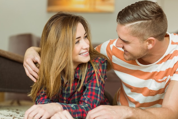 Cute couple smiling at each other