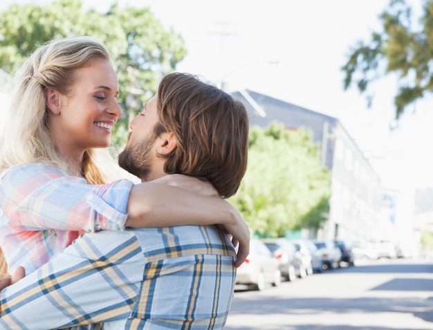 Cute couple standing and hugging 