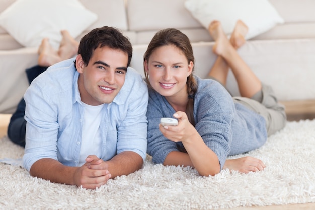 Cute couple watching TV