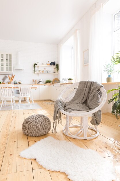 Cute cozy light interior design of the apartment