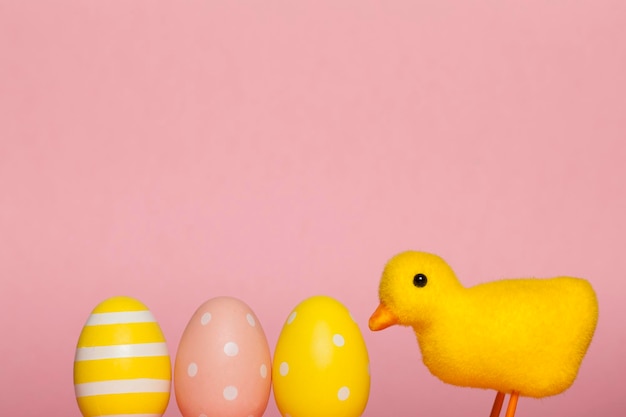 Cute easter chick carying easter eggs