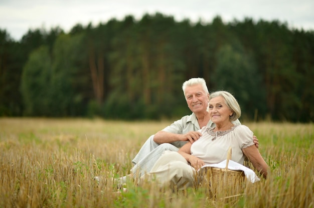 Cute elderly couple walking