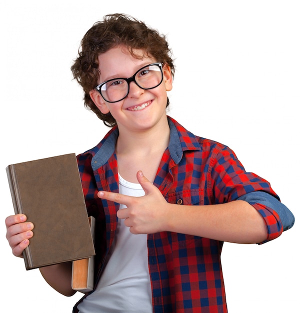 Cute elementary school boy holding book