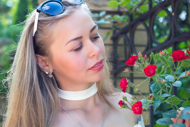 Cute engaging girl with beautiful flowers