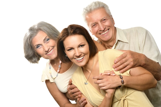 Cute family portrait , adult daughter with senior parents