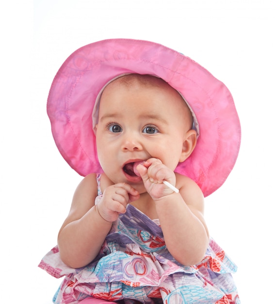 Cute female toddler with lollipop