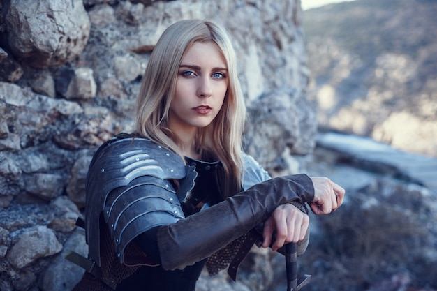 the cute female warrior attacking with sword