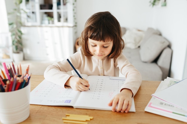 Cute five years girl learning home