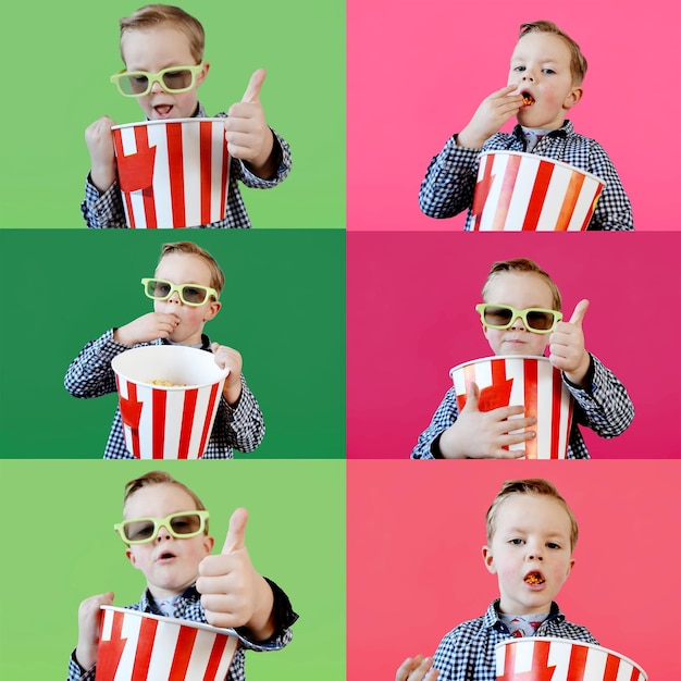 Cute fun kid baby boy year old in red tshirt holding bucket for popcorn