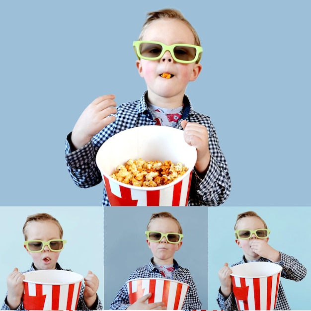 Cute fun kid baby boy year old in red tshirt holding bucket for popcorn