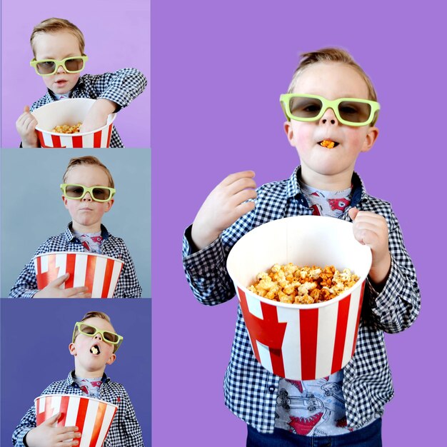 Cute fun kid baby boy year old in red tshirt holding bucket for popcorn