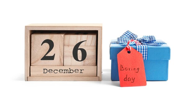 Cute gift box with calendar, isolated on white