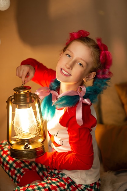 Photo cute girl before the new year in pajamas