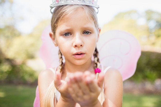 Cute girl blowing kisses