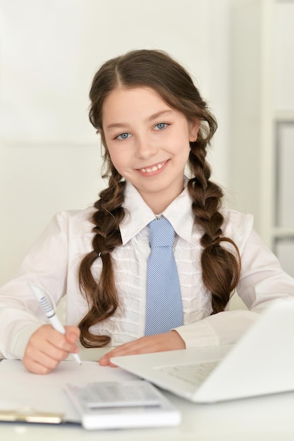 Cute girl doing homework