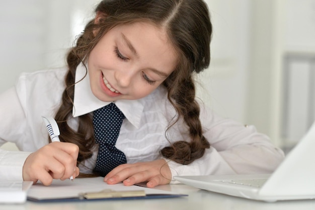 Cute girl doing homework