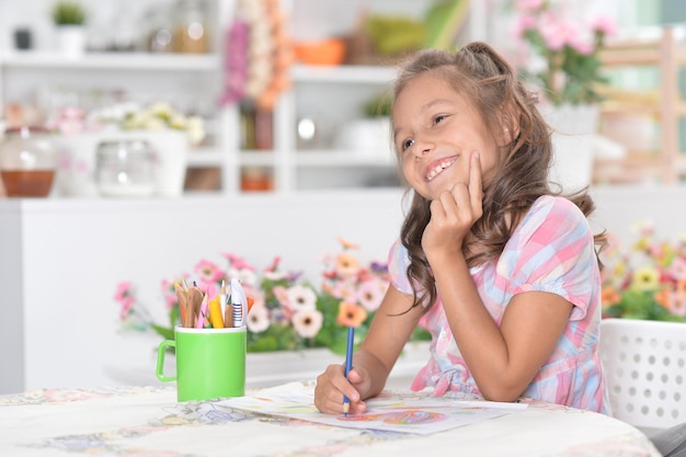 Cute girl drawing picture