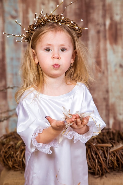 Cute girl play with real rabbit and duckling