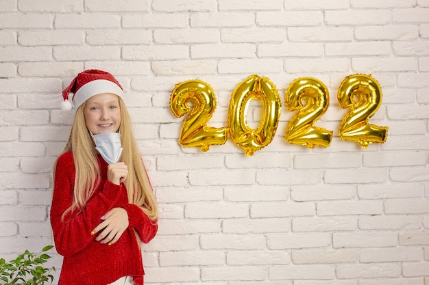 Photo cute girl preparing for the new year 2022