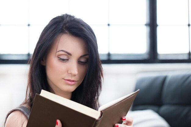 Cute girl reading a book