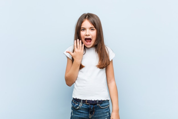 Cute girl screaming with rage.