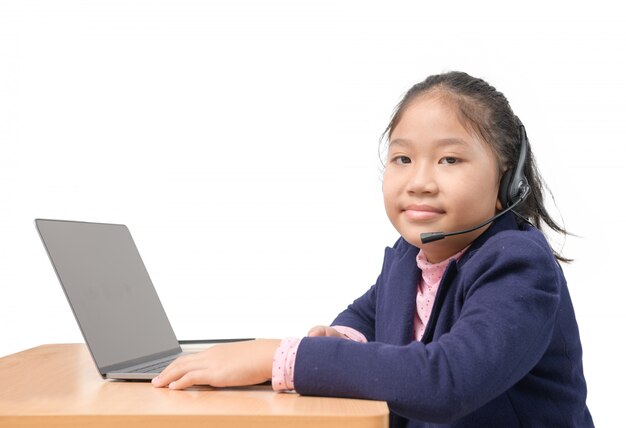 Cute girl studying online from home